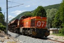 Vossloh G1200 et wagons de ballast