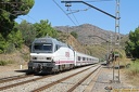 Renfe 252 057 et Talgo à Platja de Garbet (Espagne)